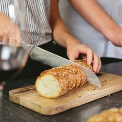 Alpha-Royal Japanese Serie 8" Brotmesser 18° Wellenschliff Damaszener-Stahl -Küchenbedarf Geschäft 10038985 de 0003 logo