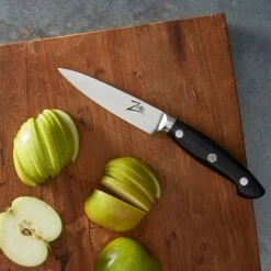 Executive-Plus Serie 4,25" Schälmesser 61 HRC Edelstahl 9 Executive-Plus Serie 4,25" Schälmesser 61 HRC Edelstahl -Küchenbedarf Geschäft 10039010 de 0004 logo